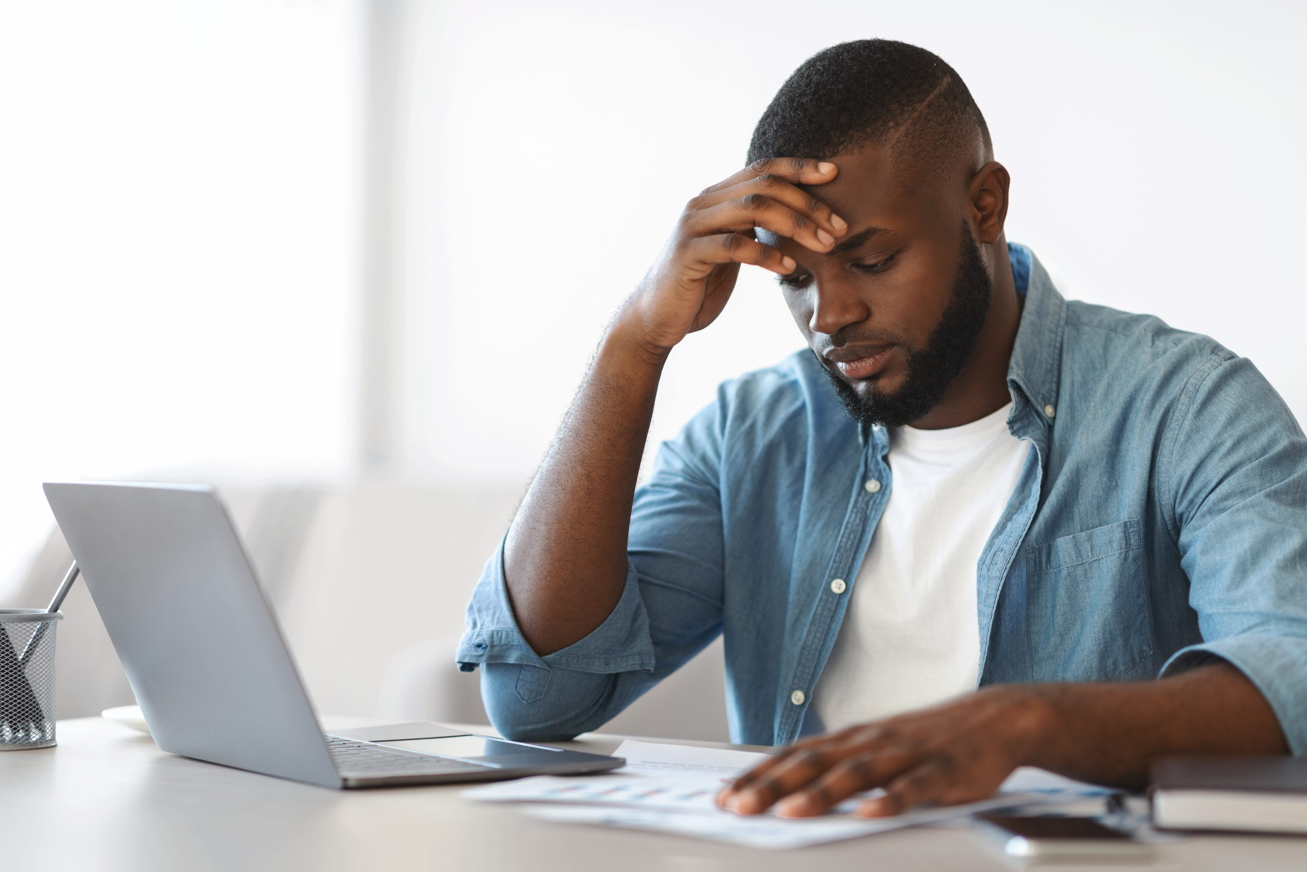 man looking worried - How To Dissolve An LLC In Texas