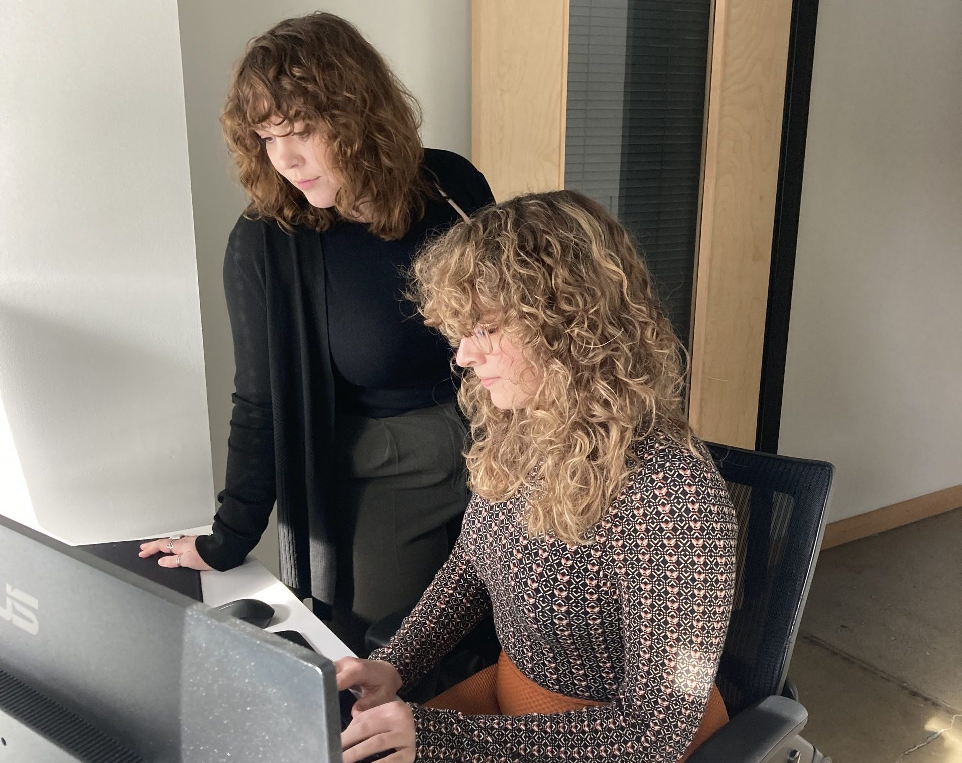 woman working in the office - How to Dissolve an LLC in Georgia