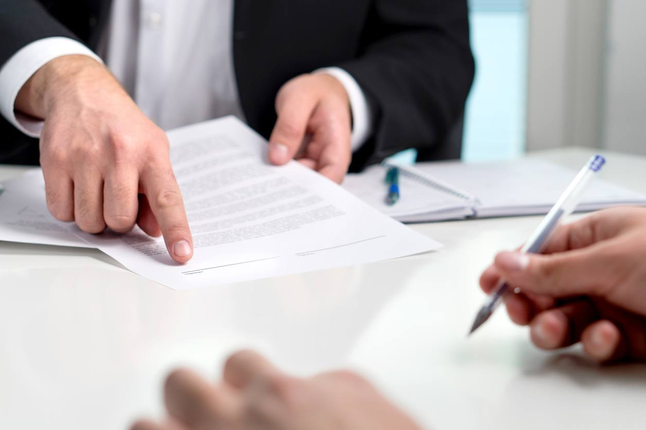 person signing a document - How to Dissolve an LLC in Kentucky