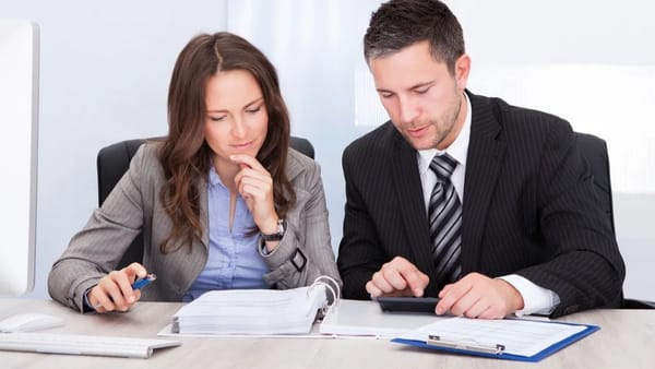 woman looking at options - How to Dissolve an LLC in Pennsylvania